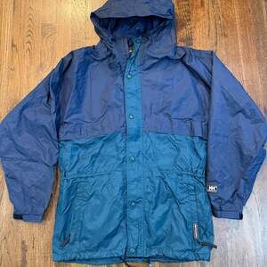 VTG Helly Hansen Men's Packable Navy Blue and Green Hooded Windbreaker Rain Jack